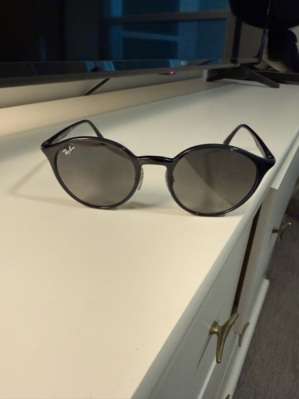 Ray-Ban Black Round Frame Sunglasses with Dark Lenses